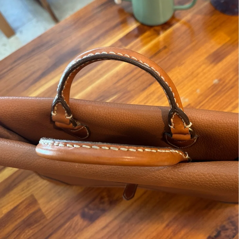 Vintage camel colored Dooney and Bourke all weather leather briefcase/laptop bag